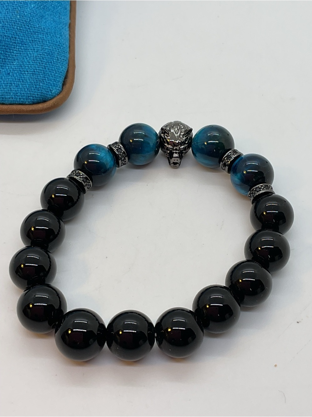 Blue and Black Beaded Stretch Bracelet with Wolf Charm - Picture 2 of 4